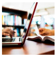  A person typing on Laptop